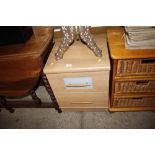 A laminate two drawer bedside chest