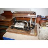 A vintage fiddle base sewing machine for re