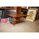 A teak oblong elephant table