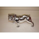 A silvered model of a bulldog