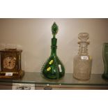 A Venetian green glass decanter