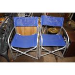 Two metal folding garden chairs