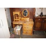 A pine dressing table fitted five drawers; a swing