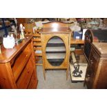 An Edwardian inlaid music cabinet