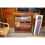 An Edwardian mahogany open fronted bookcase