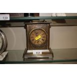 An early 20th Century carriage type clock with spr