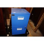 A blue Office World two drawer filing cabinet