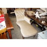 A Dralon upholstered buttoned chaise longue