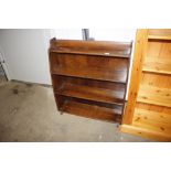 A set of open fronted mahogany bookshelves