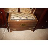 A blanket box with leather padded top; and oval pl