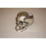 A silvered chatterbox skull