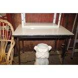 A Formica topped and chrome legged kitchen table