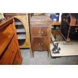 A vintage wooden gramophone cabinet