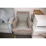 A floral upholstered deep seated easy chair