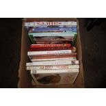 A box of various cookery books