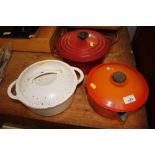 A Le Creuset saucepan and two others