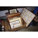 A quantity of various prints and photograph frames