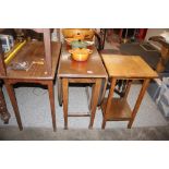 An oak drop leaf dining table