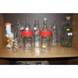 A quantity of old glass bottles and kilner jars et