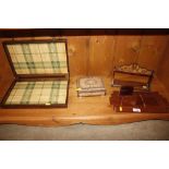 An inlaid wooden musical trinket box; small carved