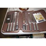 A nine piece knife set in case