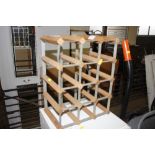 A wooden and metal wine rack