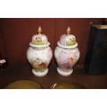 A pair of Dresden style German porcelain vases and
