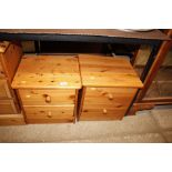 A pair of modern pine bedside chests fitted two dr