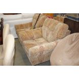 A pair of Parker Knoll floral upholstered deep sea