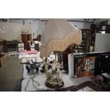 A Capo di Monte style figural table lamp and shade