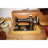 A Singer sewing machine and case