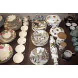 A quantity of Wedgwood collector's plates depictin