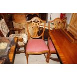 A set of eight reproduction dining chairs with Pri