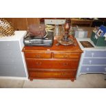 A mahogany effect chest of two short and two long