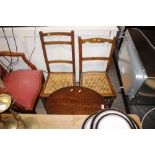 A nest of oak oval occasional tables; and two Edwa