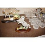 A Country Artists model of a Little Owl pair; and