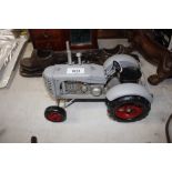 A tin plate model of a tractor