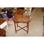 A mahogany tray top occasional table raised on cha