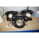 Three vintage dial telephones