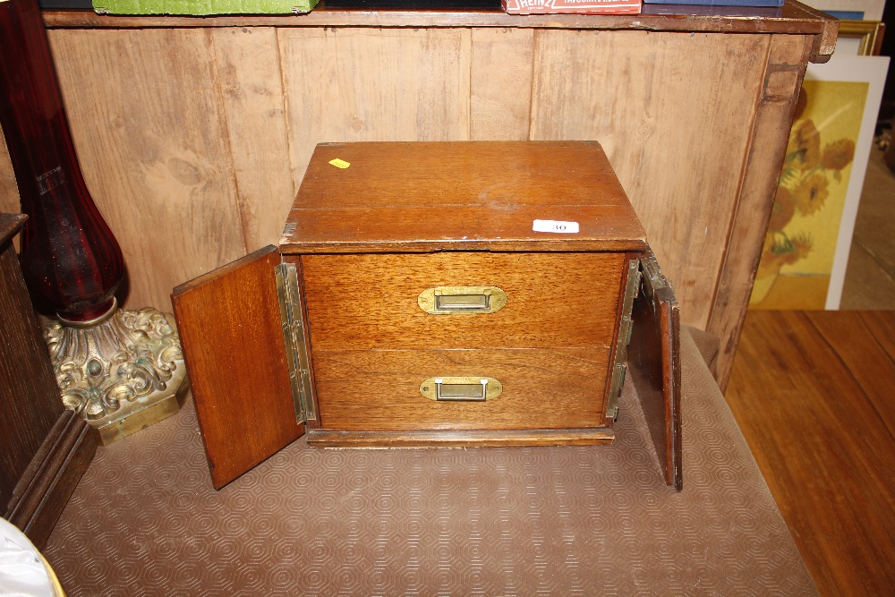 A late Victorian mahogany two drawer stationery ne