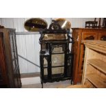 An Edwardian mahogany mirror back chiffonier