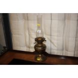 A brass oil lamp