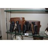 A of Wray binoculars cased; and one other pair