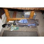 A golf bag and contents of miscellaneous clubs etc