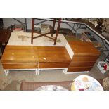 A pair of teak and laminate bedside chests; and a