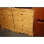 A pine effect chest fitted four long drawers