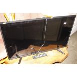 A Cello flat screen television with remote control