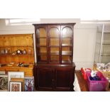 A Victorian mahogany bookcase with glazed upper se