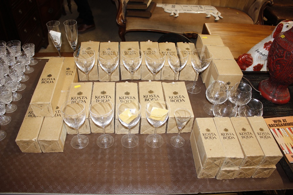 A quantity of Kosta Boda table glassware