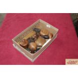 A box of assorted treen including bowling ball and